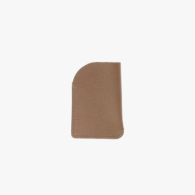 Back panel of STOW London's Mini Cardholder in Mocha pebbled leather on a light grey background  
