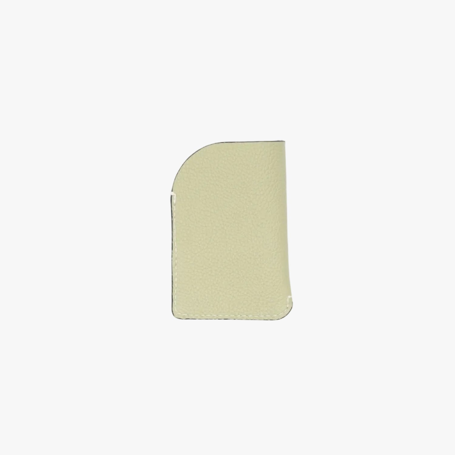 Back panel of STOW London's Mini Cardholder in Pale Green pebbled leather on a light grey background