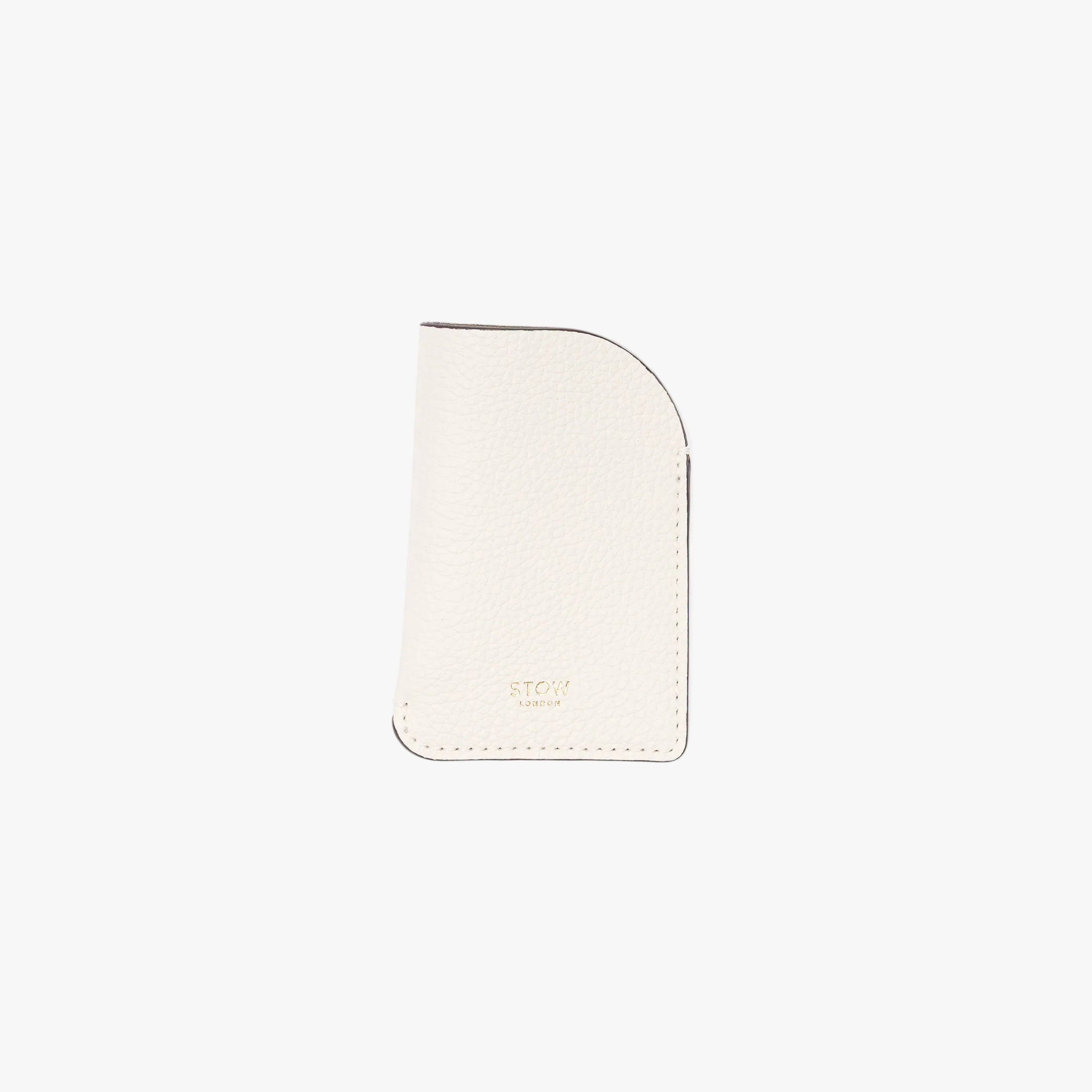 STOW London's Mini Cardholder in Spring Moon pebbled leather on a light grey background featuring a small gold embossed logo on the front bottom