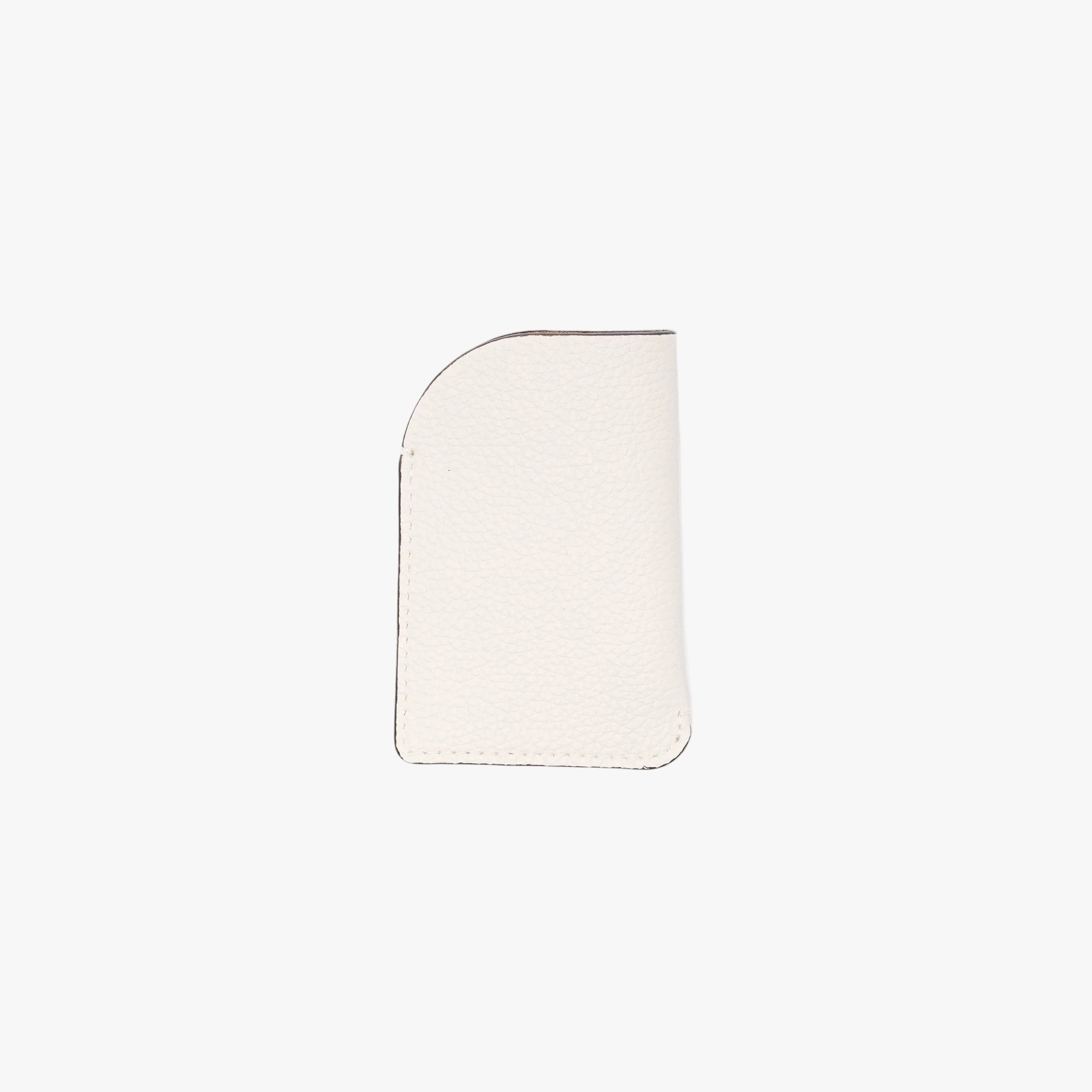 Back panel of STOW London's Mini Cardholder in Spring Moon pebbled leather on a light grey background 