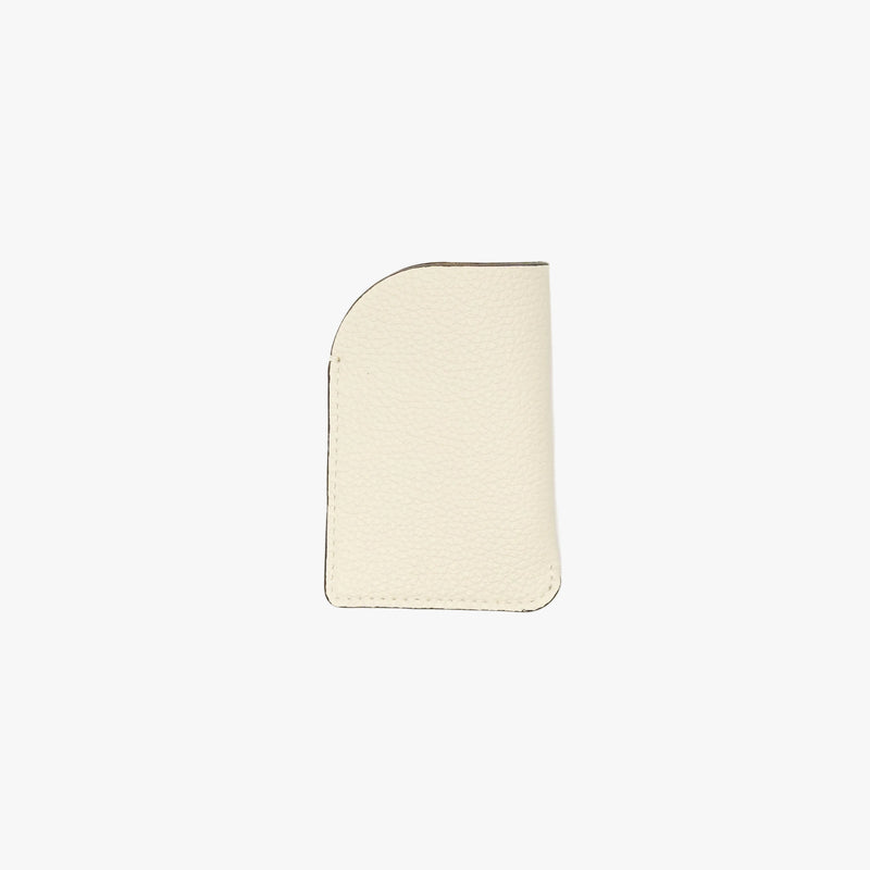 STOW London's Mini Cardholder in Spring Moon pebbled leather on a light grey background 