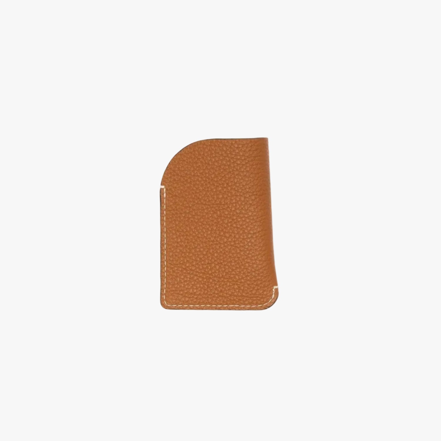 Back panel of STOW London's Mini Cardholder in Earth Tan pebbled leather on a light grey background