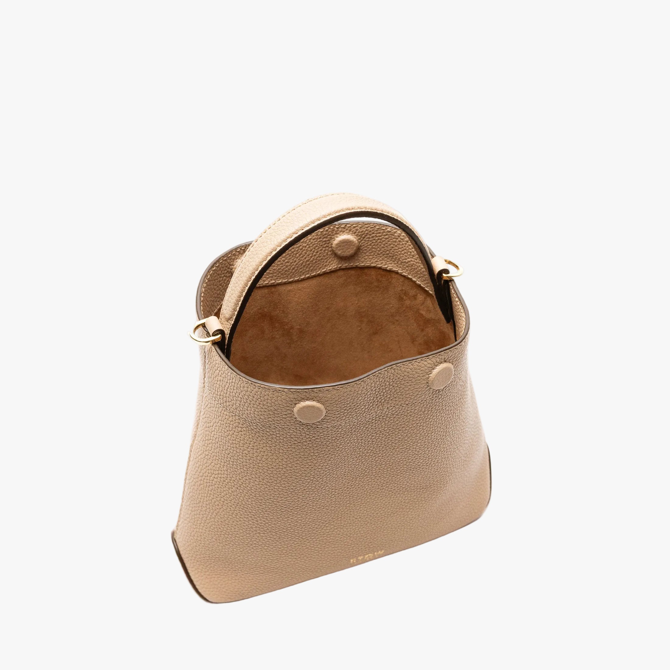 STOW London's Mini Curve in Camel pebbled leather with magnets open showing suede interior on a light grey background 