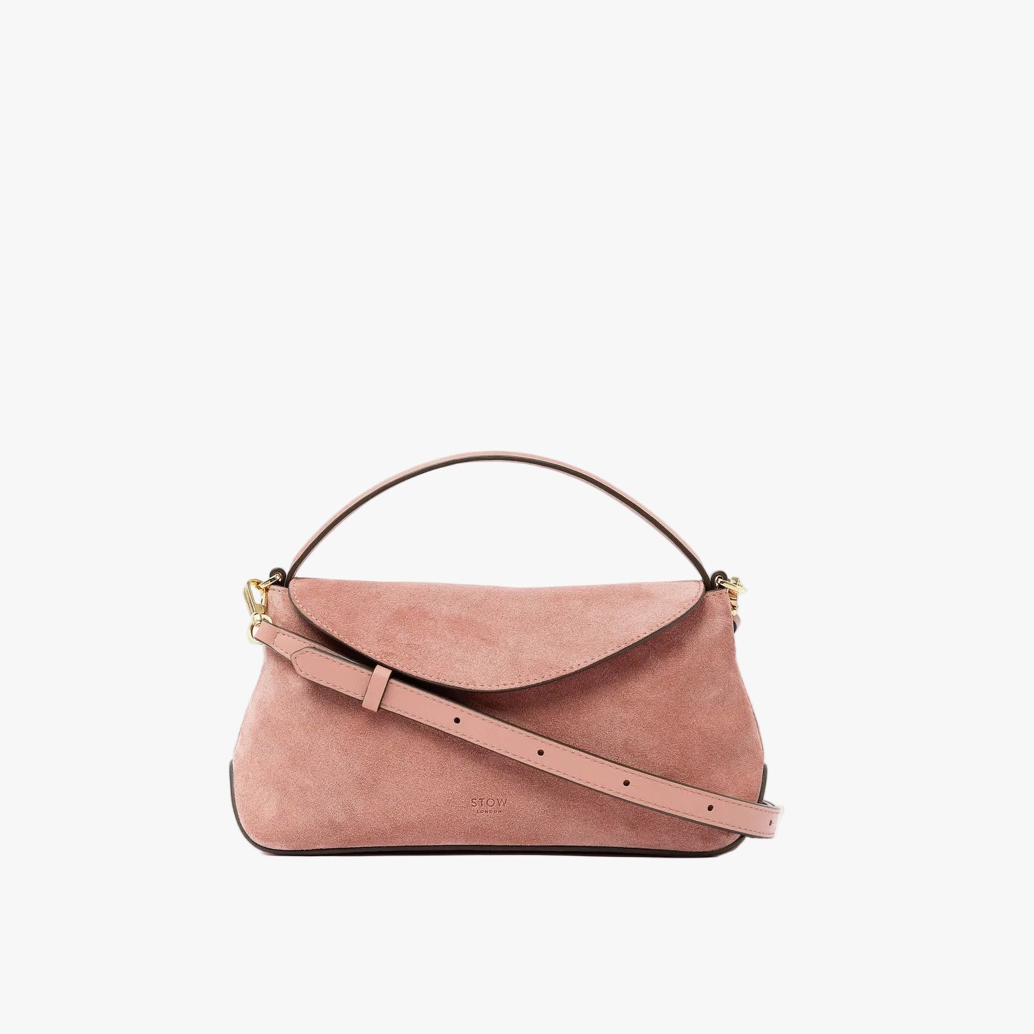 STOW London's Mini East West in Hazy Blush suede leather and detachable crossbody strap featuring gold-coated stainless steel hardware on a light grey background