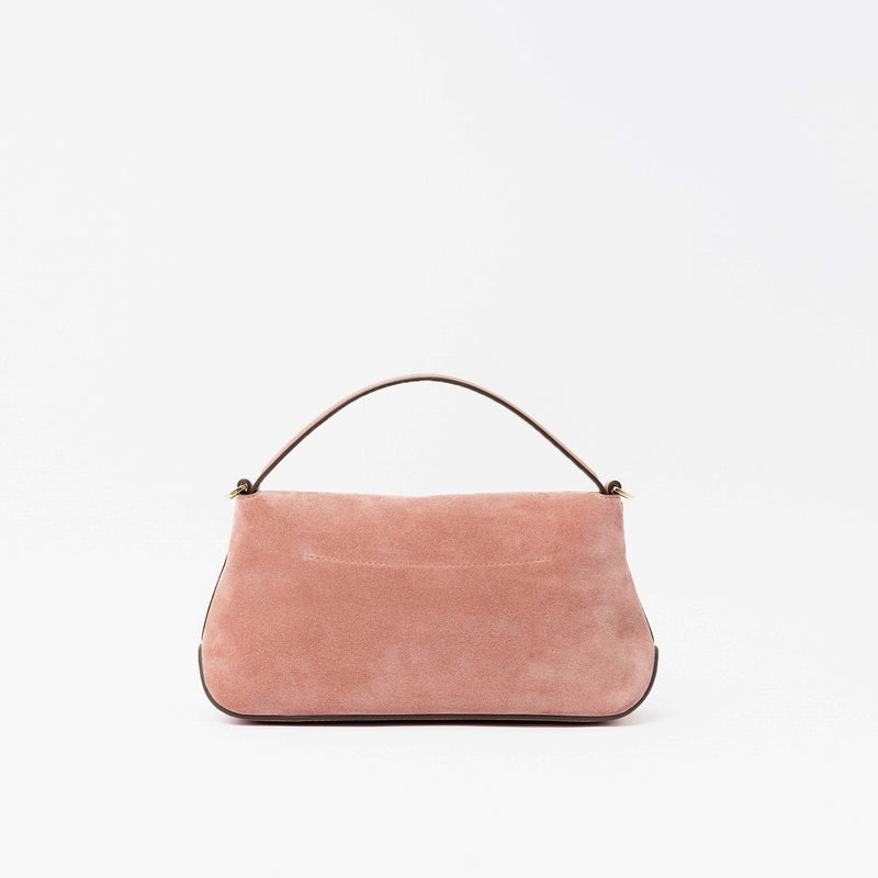 Back panel of STOW London's Mini East West in Hazy Blush suede leather featuring gold-coated stainless steel hardware on a light grey background
