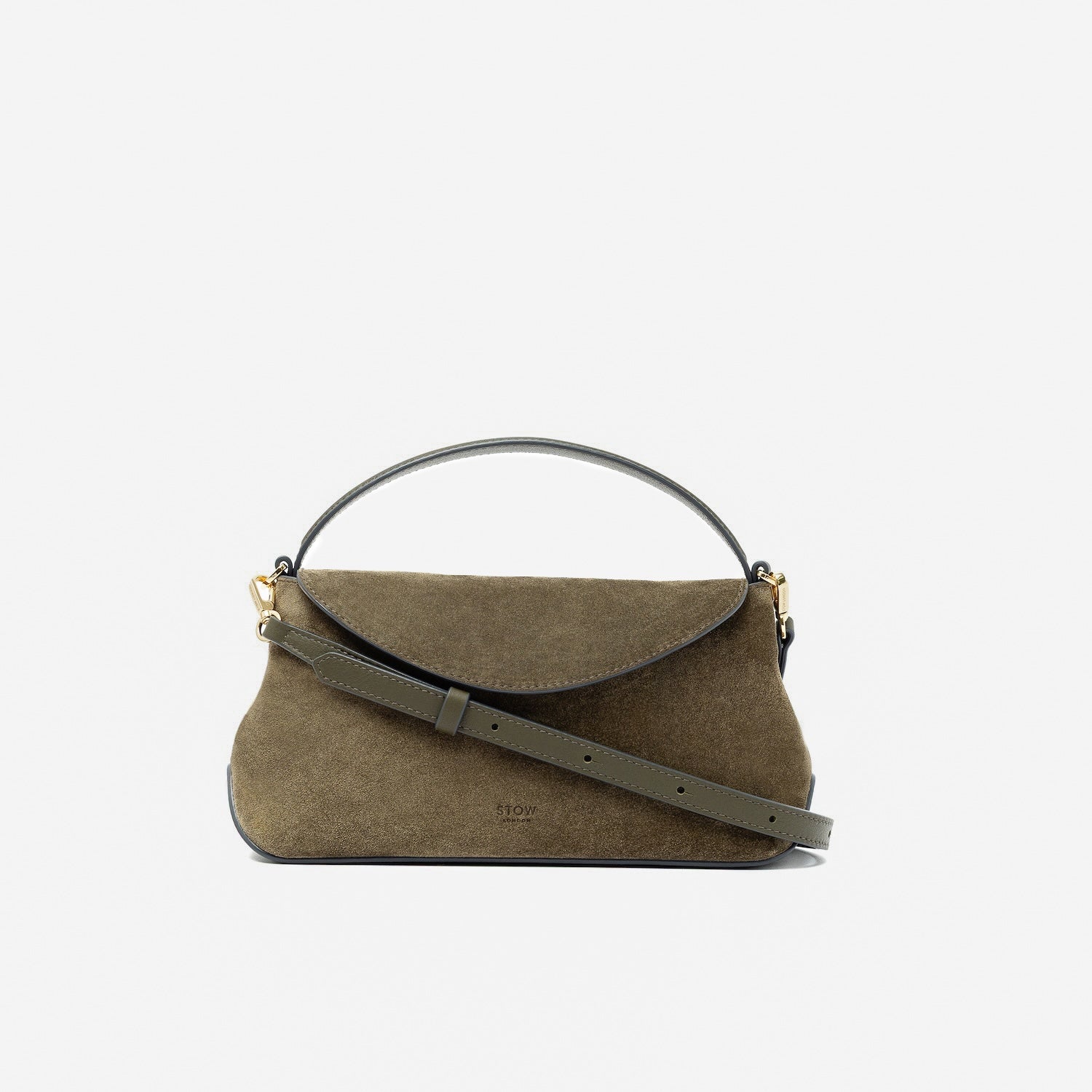 STOW London's Mini East West in Dark Green suede leather and detachable crossbody strap featuring gold-coated stainless steel hardware on a light grey background