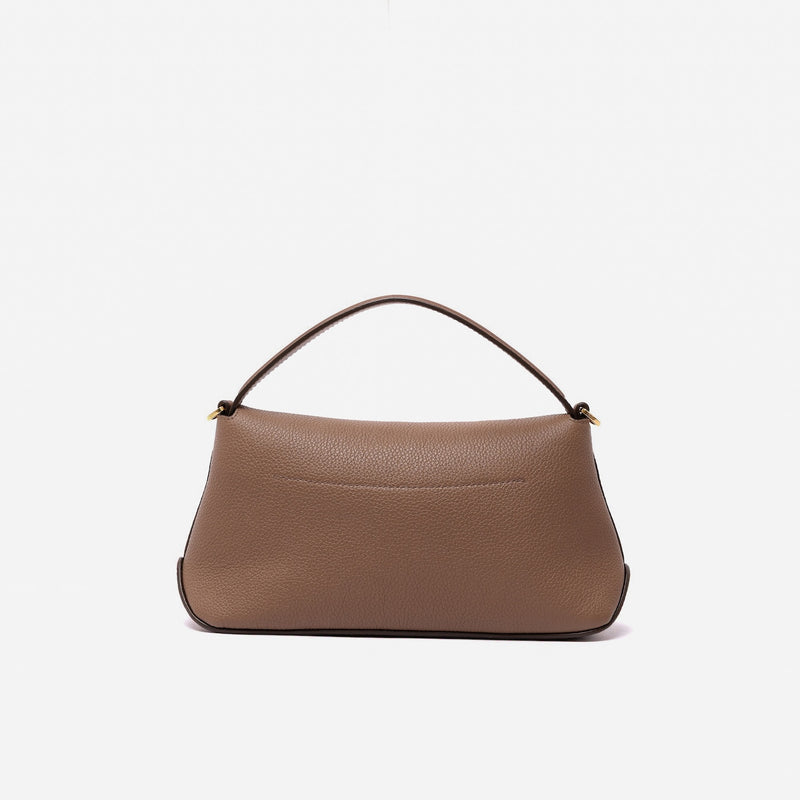 Back panel of STOW London's Mini East West in Mocha pebbled leather featuring gold-coated stainless steel hardware on a light grey background