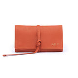 STOW Mini Jewellery Roll in Clay Orange colour with personalised initials on the flap.
