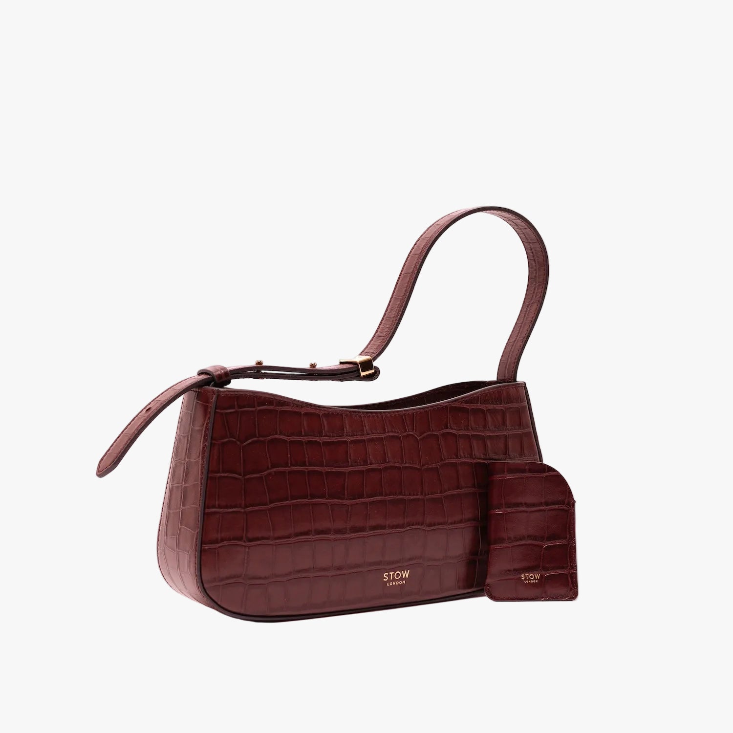 STOW London's Mini Cardholder in Burgundy Embossed Croc leather and matching Post Shoulder Bag on a light grey background featuring a small gold embossed logo on the front bottom