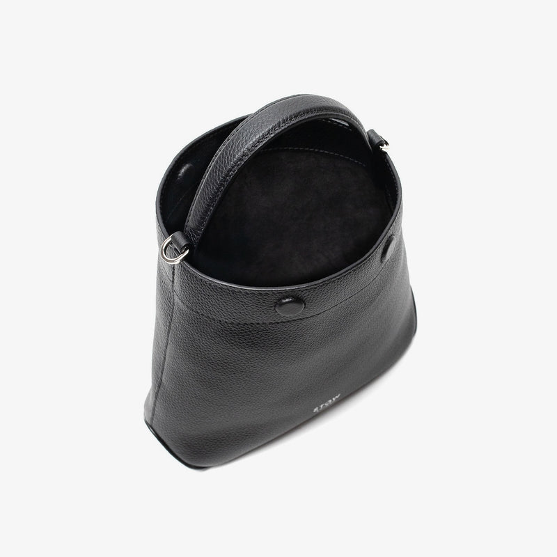 Stow London's Mini Curve in Black pebbled leather with magnets open showing black suede interior lining on a light grey background 