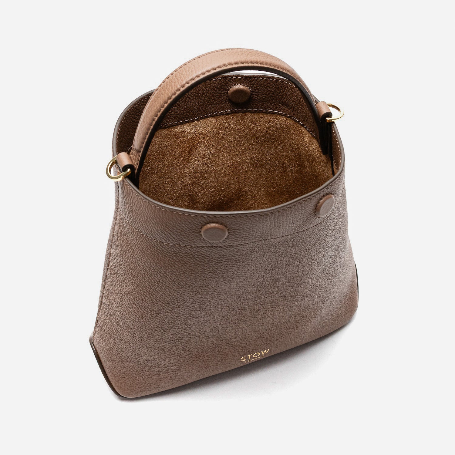 Stow London's Mini Curve in Mocha pebbled leather with magnets open showing suede interior lining on a light grey background 