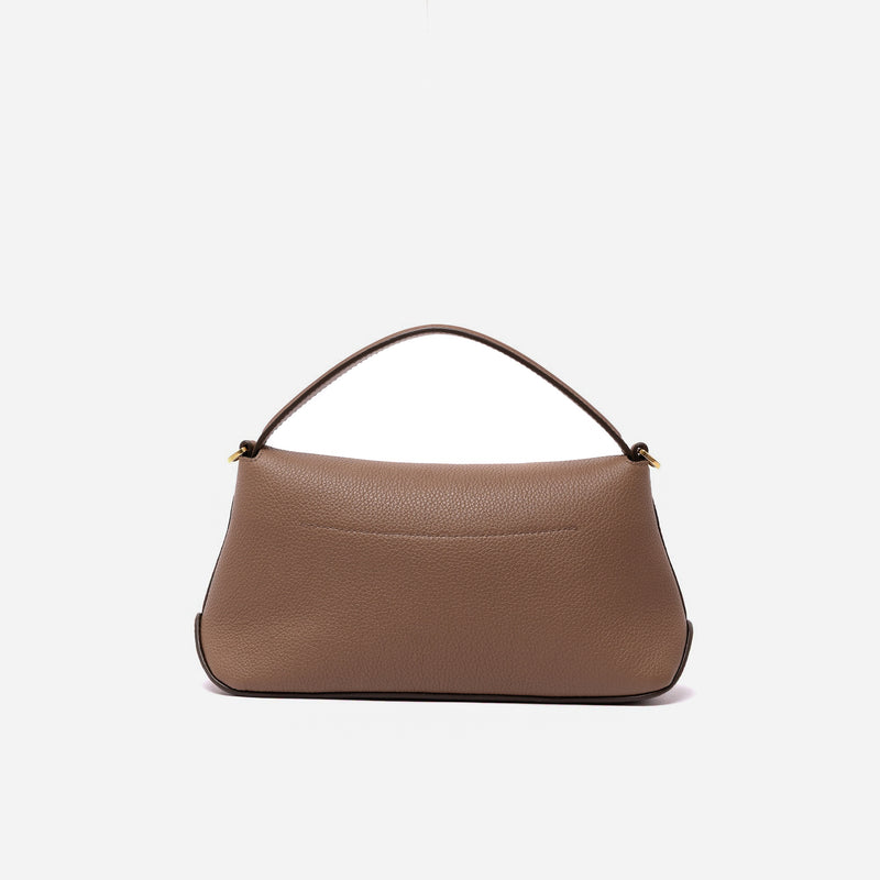 Back panel of STOW London's Mini East West in Mocha pebbled leather featuring gold-coated stainless steel hardware on a light grey background