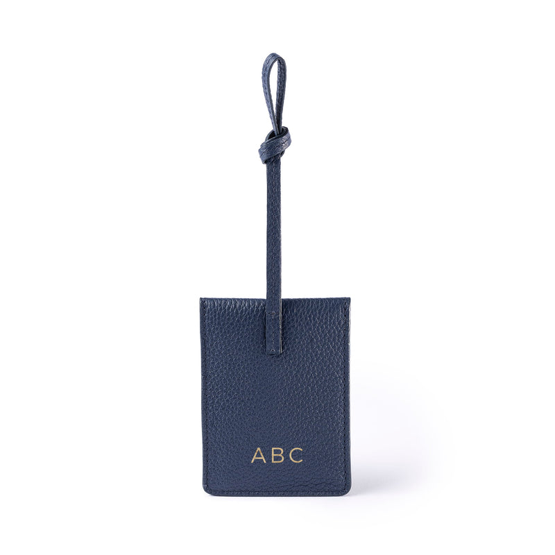 STOW Leather Multi Tag in Navy pebbled leather with personalised initials on the back.
