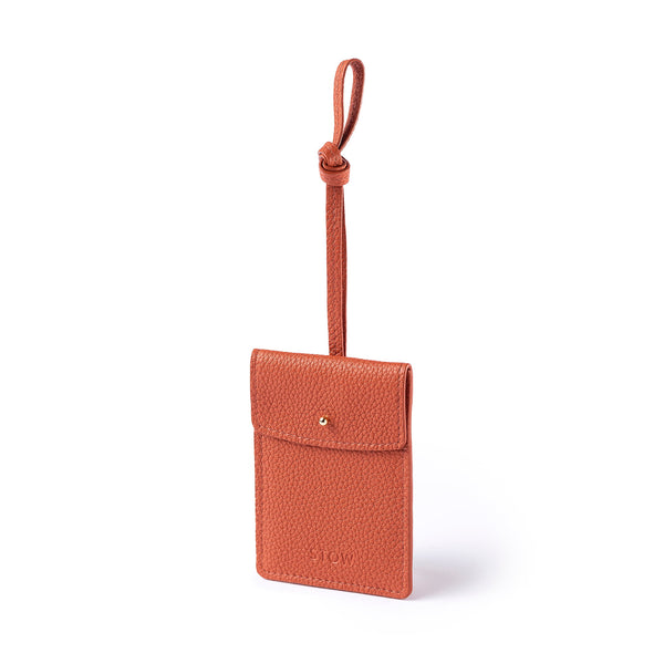 STOW Leather Multi Tag in Clay Orange pebbled leather.