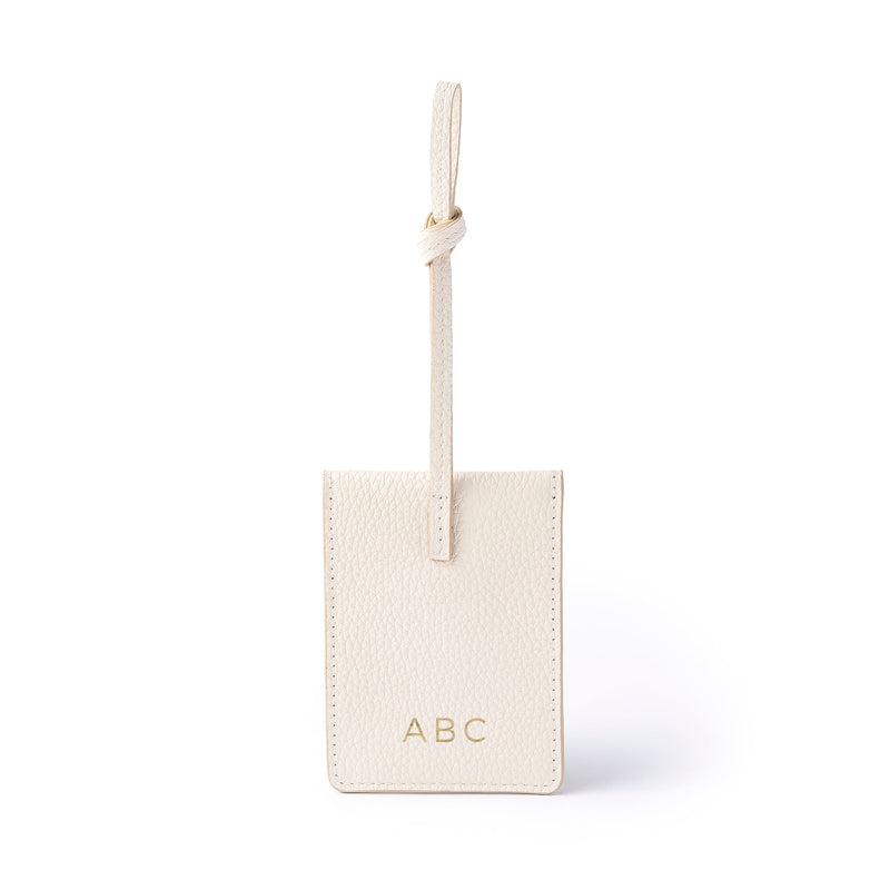 STOW London Leather Multi Tag in Spring Moon pebbled leather with personalised initials on the back.