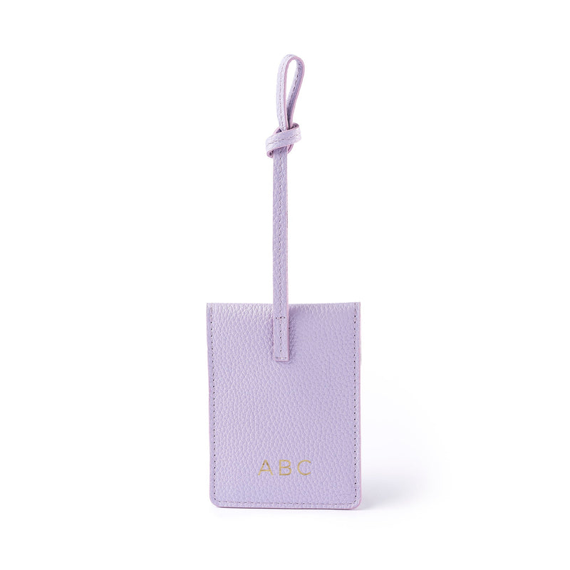 STOW London Leather Multi Tag in Wild Lavender pebbled leather with personalised initials on the back.
