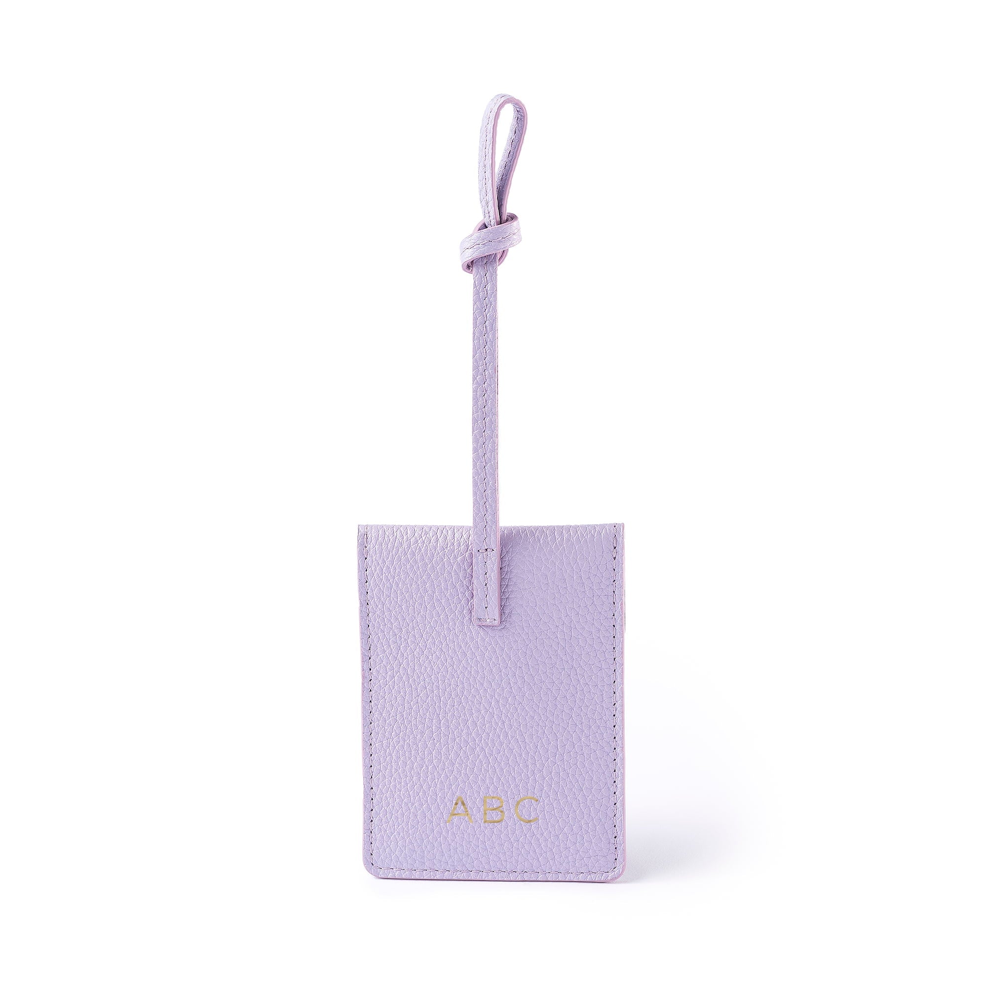STOW Leather Multi Tag in Wild Lavender pebbled leather with personalised initials on the back.
