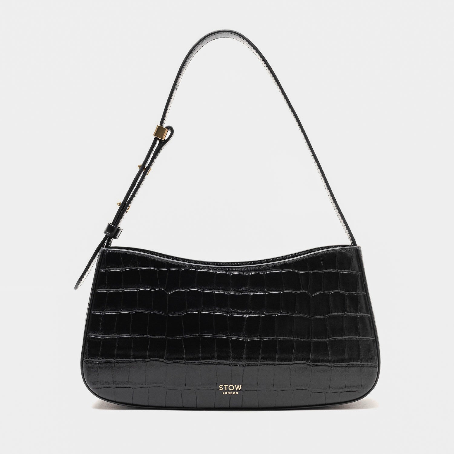 Stow London's Post Shoulder in Black Embossed Croc leather on a light grey background featuring gold-coated stainless steel hardware