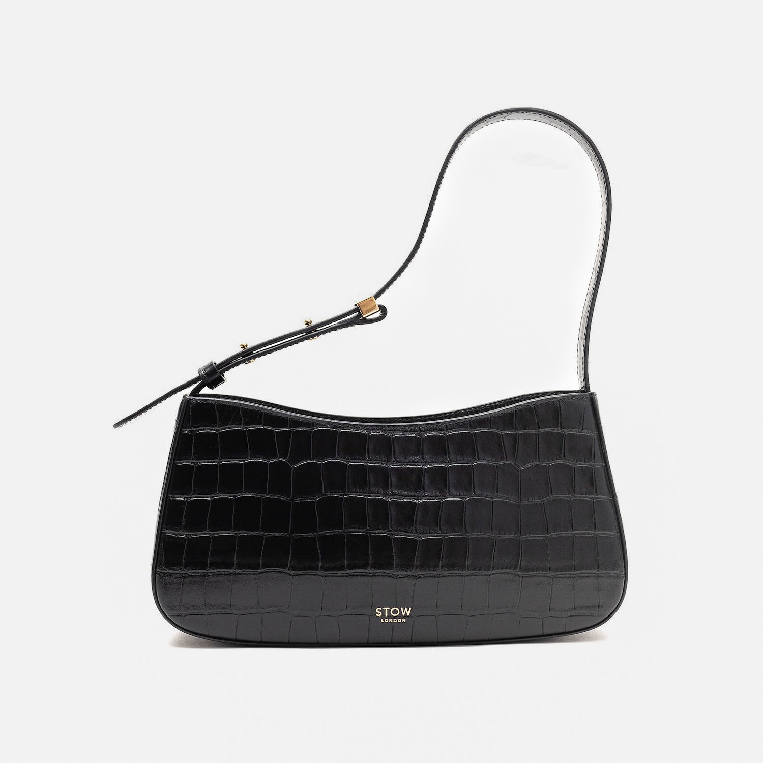 Stow London's Post Shoulder in Black Embossed Croc leather on a light grey background featuring gold-coated stainless steel hardware
