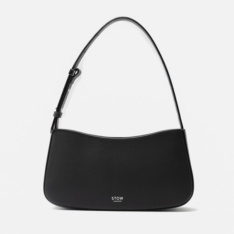 Stow London's Post Shoulder in Black smooth leather on a light grey background featuring silver STOW logo