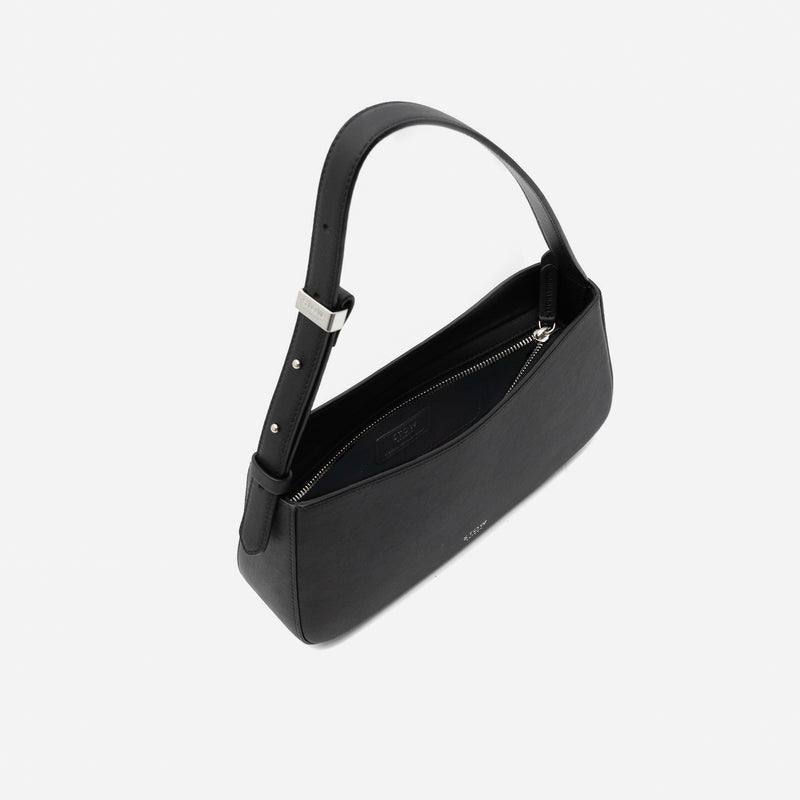 Stow London's Post Shoulder in Black smooth leather with zip open showing black cotton interior and slip pocket on a light grey background featuring silver stainless steel hardware