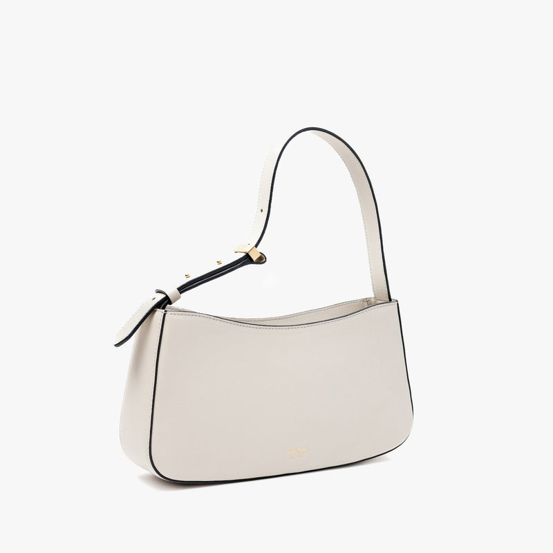 Off-axis view of Stow London's Post Shoulder in Cloud Grey smooth leather on a light grey background featuring gold-coated stainless steel hardware