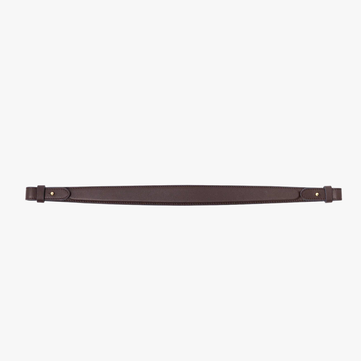 The detachable shoulder strap in espresso smooth leather on a light grey background 