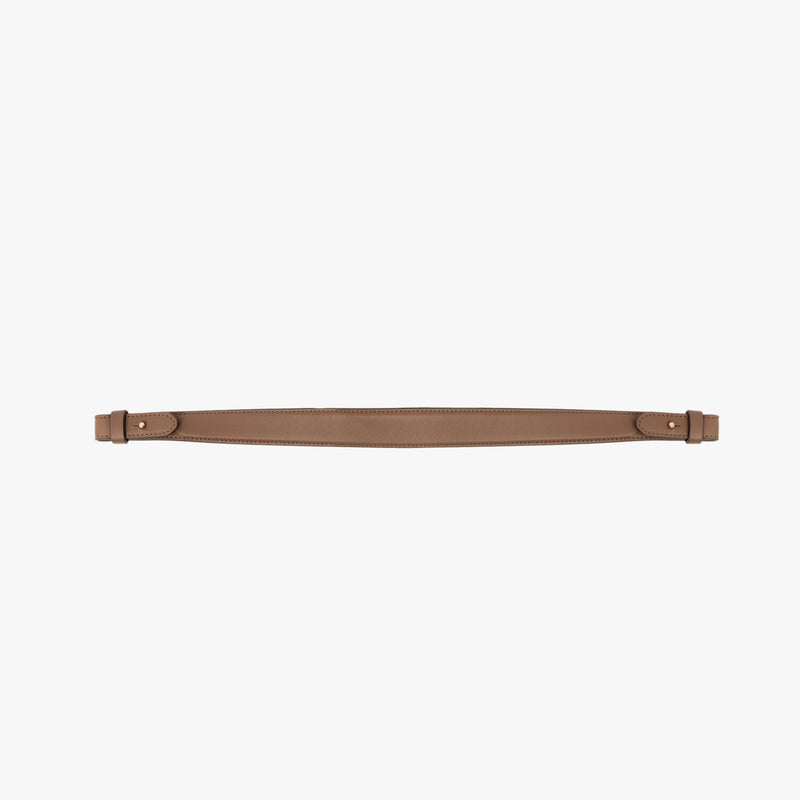 Detachable shoulder strap for STOW London's Curve, Midi Curve and East West in Mocha smooth leather on a light grey background featuring gold hardware 