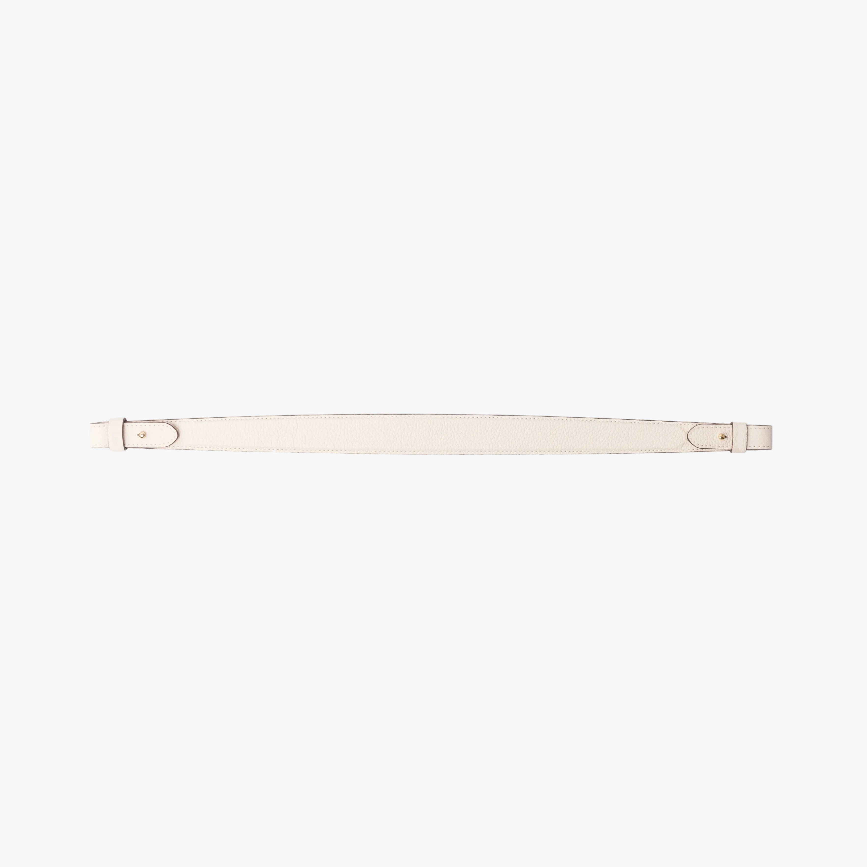 Detachable shoulder strap for STOW London's Curve, Midi Curve and East West in Spring Moon pebbled leather on a light grey background featuring gold hardware 