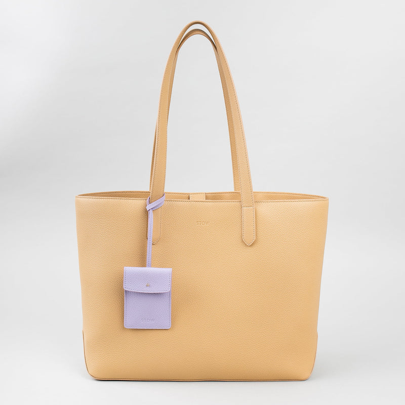 STOW Leather Multi Tag in Wild Lavender pebbled leather shown hanging on Almond Everyday Tote Bag by STOW.