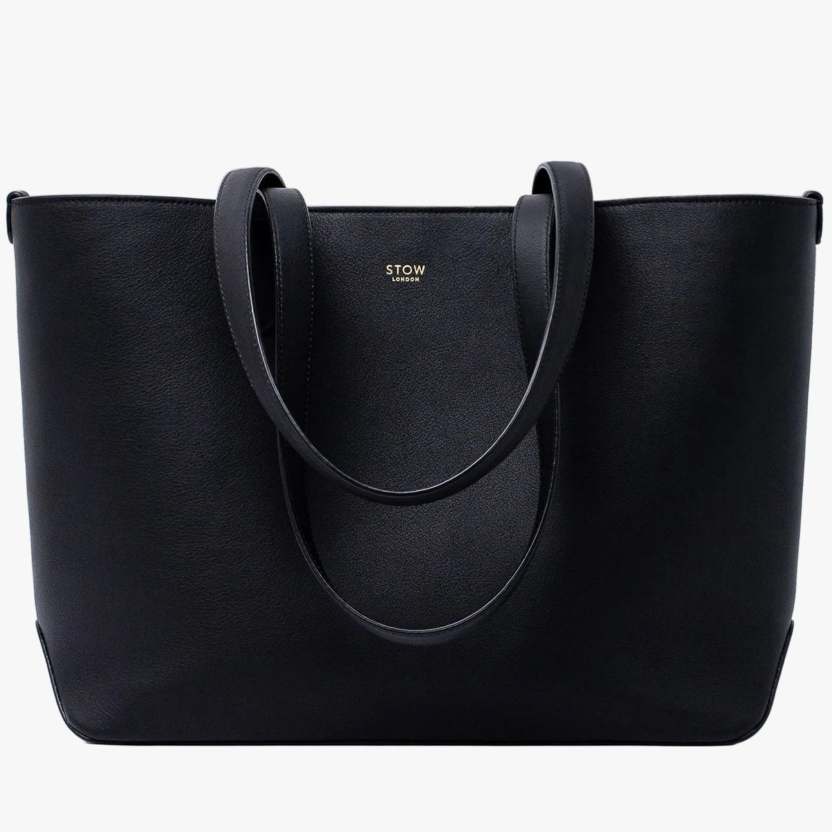 Stow London's Everyday Tote Bag in Black smooth leather on a light grey background featuring gold STOW logo
