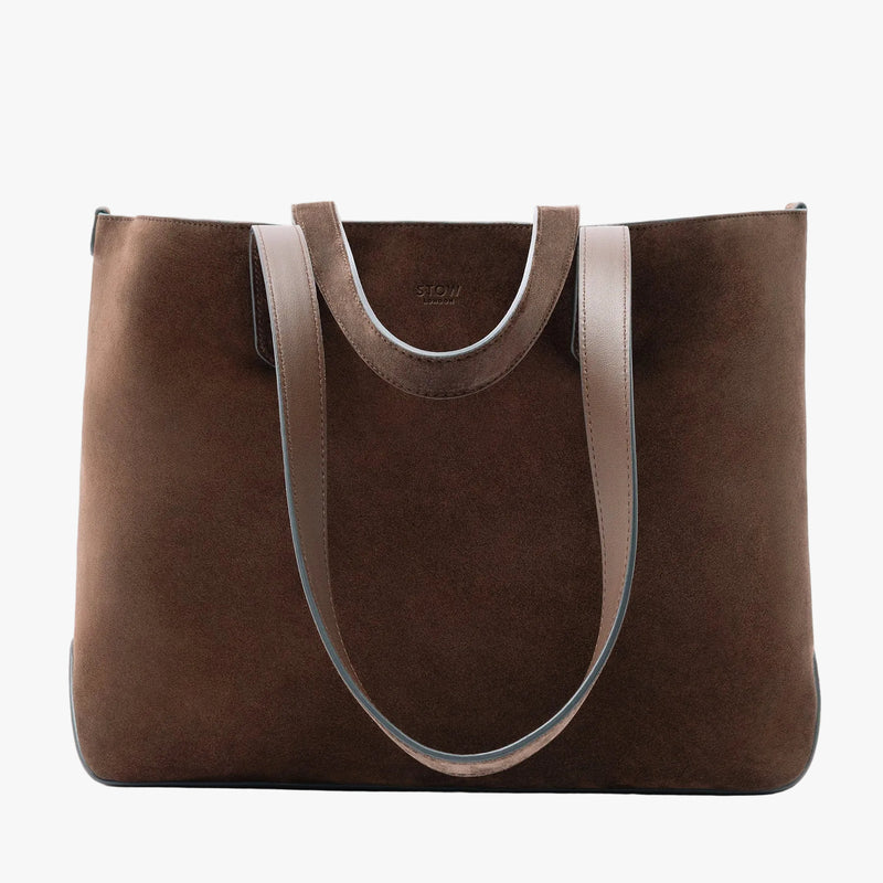 STOW London's Everyday Tote bag in Chocolate suede on a light grey background featuring a small STOW London logo embossed on the front panel