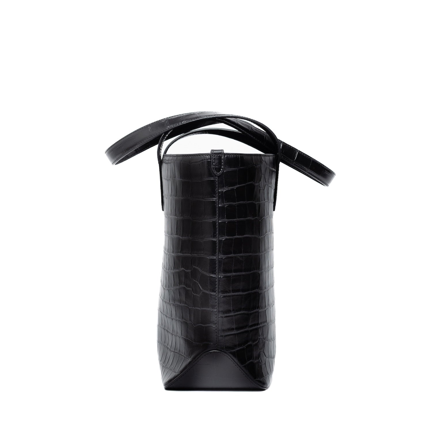 Side view of Black Embossed Croc Everyday Tote Bag shown on a white background