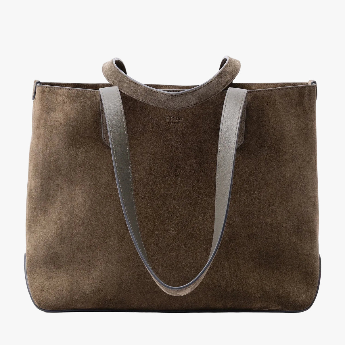 STOW London's Everyday Tote bag in Dark Green suede on a light grey background featuring a small STOW London logo embossed on the front panel
