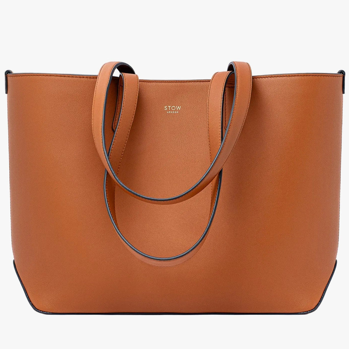 Stow London's Everyday Tote Bag in Earth Tan smooth leather on a light grey background featuring gold STOW logo