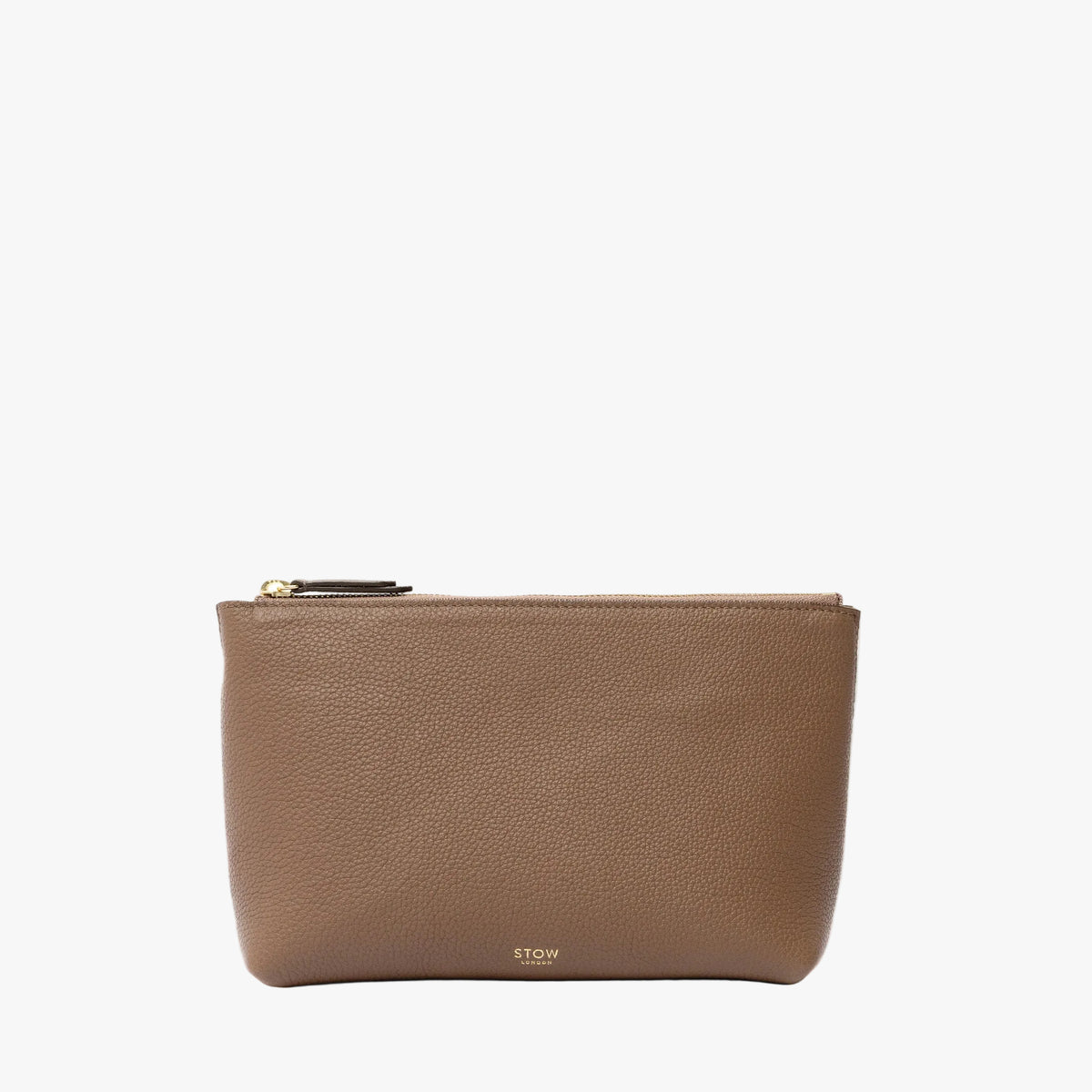 STOW London's travel pouch in Mocha pebbled leather on a light grey background featuring a YKK zip and a fine gold embossed logo on the front 