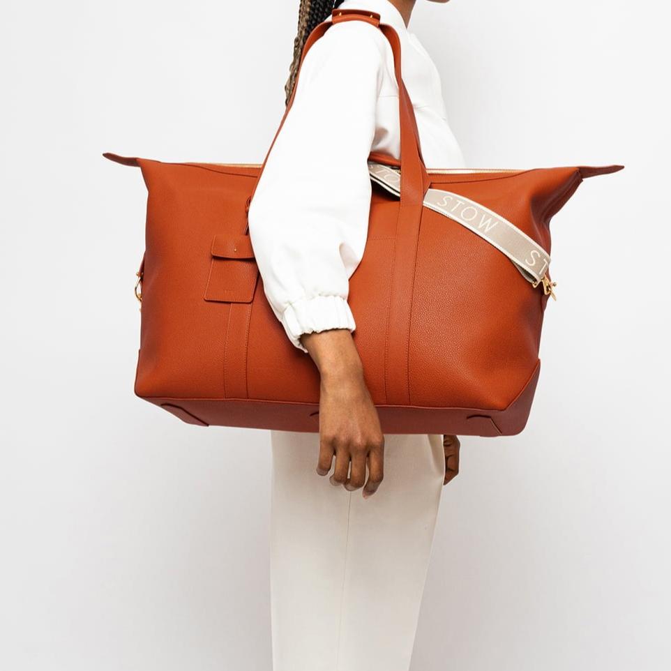 STOW Leather Weekend Bag in Clay Orange pebbled leather.