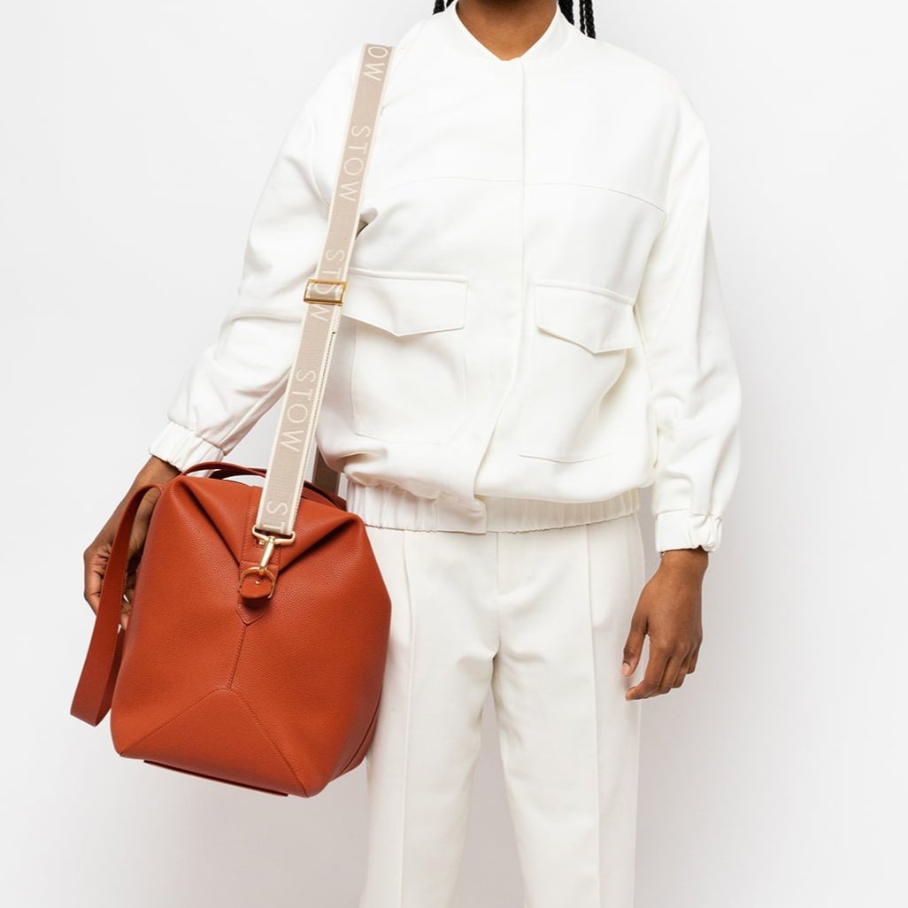 STOW Leather Weekend Bag in Clay Orange pebbled leather.