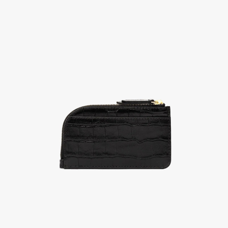 Back panel of STOW London's Zip Wallet in Black Embossed Croc leather on a light grey background featuring a YKK Natulon zipper and the rear slip pocket