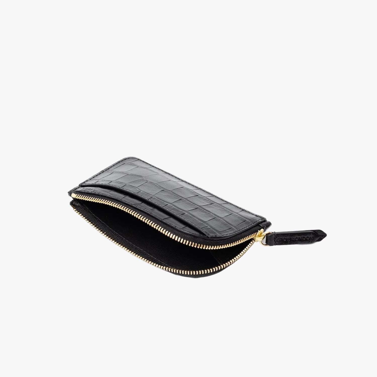 STOW London's Zip Wallet in Black Embossed Croc leather on a light grey background with zipper open showing interior of wallet