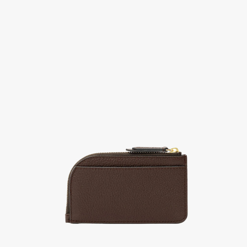 Back panel of STOW London's Zip Wallet in Espresso pebbled leather on a light grey background featuring a YKK Natulon zipper and the rear slip pocket