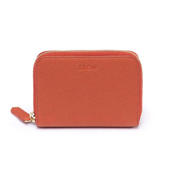 STOW Leather Zip Wallet in Clay Orange pebbled leather.