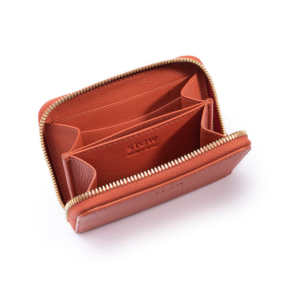 STOW Leather Zip Wallet in Clay Orange pebbled leather showing inside.