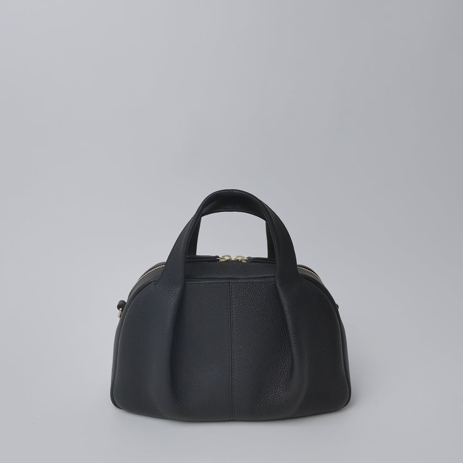 Mini Bowling Bag in Chocolate Suede Leather from STOW London