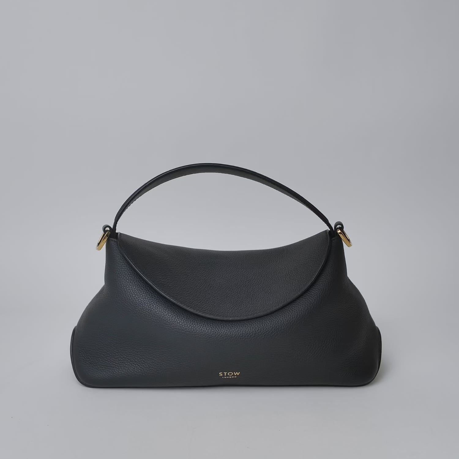 STOW London's East West Curve Bag What Fits