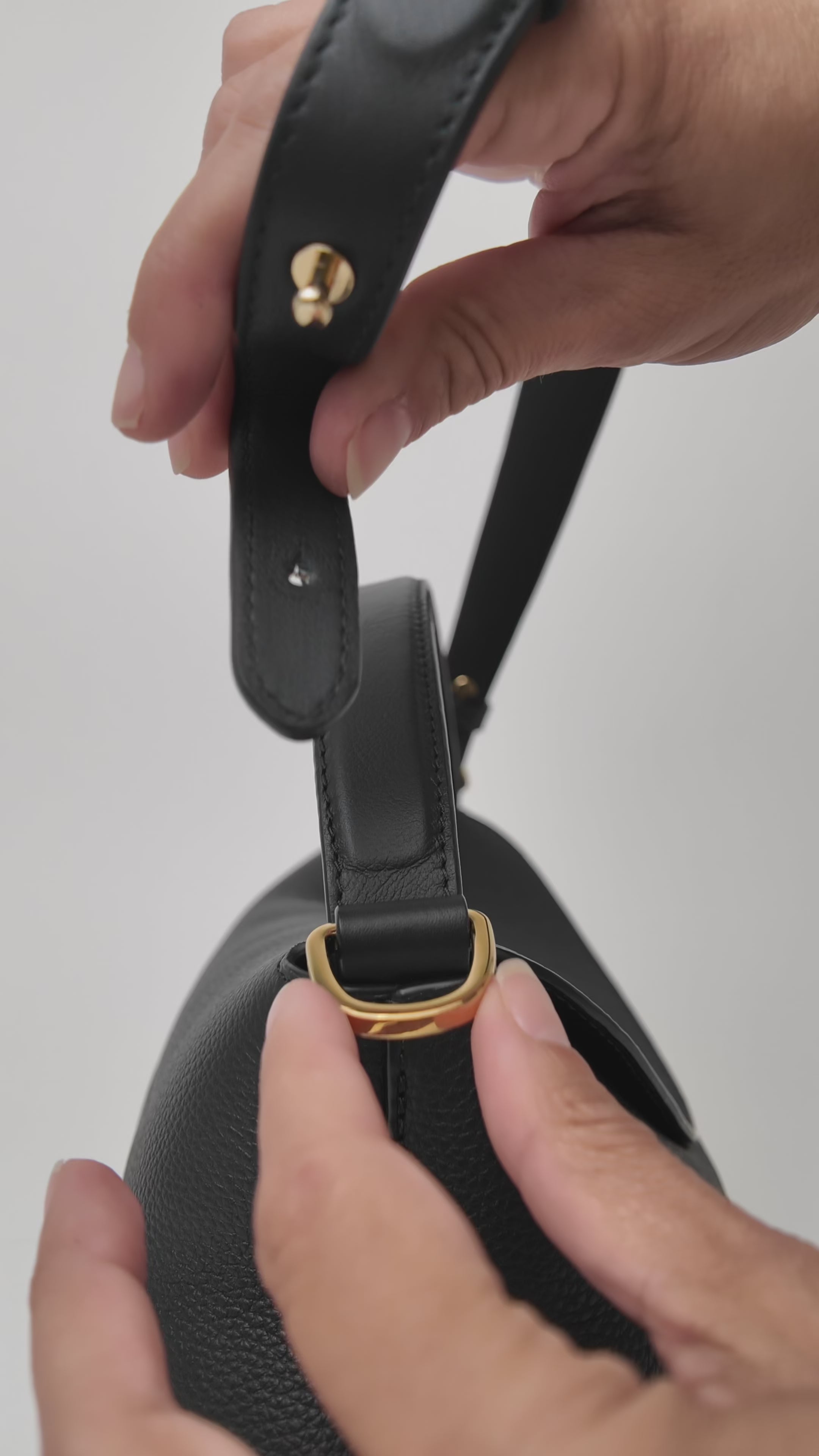 Detachable strap attachment for the East West bag